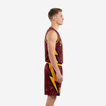 Front view of custom maroon and gold basketball uniform showing gold crew-neck binding, arced team name, and number 00 on jersey and shorts