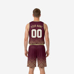 Left side view of maroon and gold basketball uniform for school programs showing armhole binding and diamond pattern on shorts leg