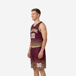 Right side angle of custom maroon and gold basketball uniform set showing gold diamond lattice hem detail on jersey and matching shorts