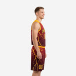 Side view of maroon and gold basketball uniform set showing gold armhole binding and lightning pattern on jersey and shorts