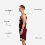 Back view of the custom maroon and gold reversible basketball uniform showing back number placement and brush-stroke design across the shoulders