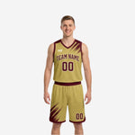 Front view of the maroon side of a custom reversible basketball uniform with arched team name, number 00, gold V-neck collar, and matching shorts
