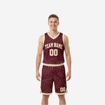 Maroon and gold reversible basketball uniforms shown front and back with contour-line pattern, arched team name, and front and back numbers