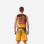 Opposite side view of gold reversible basketball uniform side with maroon V-neck binding and white lightning bolt sublimation pattern on jersey and shorts