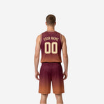 Opposite side view of maroon and gold reversible basketball uniform showing armhole binding and gradient side panel