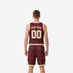Side view of maroon and gold reversible basketball uniform showing sleeveless cut, contour pattern, and cream-gold armhole binding