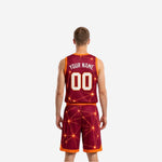 Side view of the maroon and gold reversible basketball uniform showing armhole binding and side seam construction on the maroon jersey and shorts