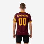 Back view of custom maroon soccer training jersey with Athletic Gold player name and number on solid Maroon panel