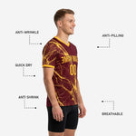 Close front detail of maroon soccer training jersey showing team name and number print zones in Athletic Gold
