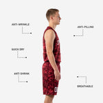 Detail view of maroon digital camo basketball shorts with white number on left leg, elastic waistband and pixelated camo pattern