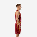 Front view of custom maroon basketball uniforms for men with gold arched team name, front number, gold armhole binding and gold side stripe on the sleeveless jersey