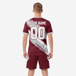 Close detail of maroon grey sublimated soccer kit showing v-neck collar trim and brush stroke graphic
