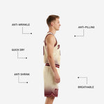 Detail view of maroon halftone dot fade pattern on basketball shorts legs with maroon waistband and hem binding on cream youth uniform set