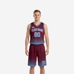 Maroon and light blue reversible basketball uniforms front view showing halftone-dot fade pattern on the maroon side with light blue team name and number