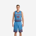 Light blue side of the custom reversible basketball uniform set with maroon halftone-dot hem pattern team name and player number printed on the chest