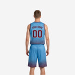 Opposite side view of the custom reversible basketball jersey and matching shorts highlighting the full-body sublimated halftone-dot design