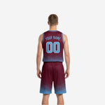Side view of the maroon and light blue reversible basketball uniform showing V-neck binding armhole trim and shorts hem dot pattern