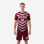 Front view of maroon and silver chevron custom soccer uniform with team name and number