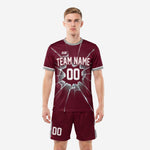 Custom maroon and silver shattered glass soccer kit front view, sublimated team uniform