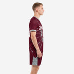 Maroon soccer kits with silver trim, side view showing full sublimated design