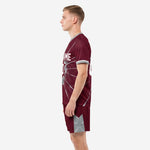 Custom soccer uniform in maroon with silver shattered glass pattern, right side profile