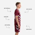 Maroon soccer uniform shorts with silver chevron side panel and player number