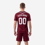 Close detail of maroon and silver chevron soccer outfits chest panel and V-neck trim