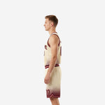 Opposite side view of maroon trim custom youth basketball uniform sets showing side seam construction and breathable polyester fabric detail