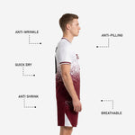 Maroon soccer shorts with white dot-burst sublimated pattern and contrast white side panels, side view detail