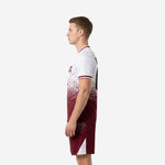 Maroon soccer uniforms with scatter dot pattern, right side view showing contrast side panel detail on shorts and sleeve trim