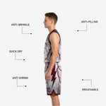 Close-up of maroon and white reversible basketball shorts with lightning sublimation and player number on the lower left leg
