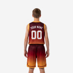 Back view of maroon youth basketball uniforms showing back number placement on sublimated gradient jersey and matching shorts