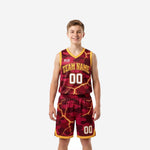 Maroon youth basketball uniforms with gold lightning camo pattern, V-neck jersey and matching shorts, full set front view
