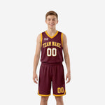 Custom maroon youth basketball uniforms two-piece set with gold trim, arched team name, and front and back player numbers on a youth player