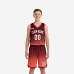 Custom maroon youth basketball uniforms front view showing coral gradient hex jersey and matching shorts with team name and number 00
