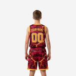 Opposite side view of maroon and gold camo lightning youth basketball uniform showing full sublimation coverage on jersey and shorts