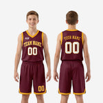 Right side view of custom maroon youth basketball uniform with gold hem chevron detail on matching maroon basketball shorts