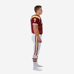 custom youth football uniform set in maroon and gold showing V-neck collar gold shoulder yoke sleeve number and white pant with dual stripe side view