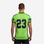 Right side view of the sublimated neon green and black football jersey highlighting the side panel ventilation and straight hem