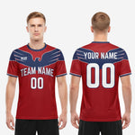Men custom soccer jersey in crimson red and navy blue athletic cut, full body view, K2 Sportswear made to order