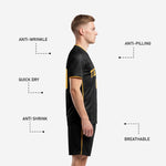 Mens all black soccer shorts with Athletic Gold side stripe and leg number from custom soccer uniform set