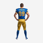 Sublimated american football uniform back view displaying back number, player name area, white side panels, and gold pants with white leg stripe