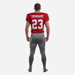 Back view of mens sublimated red and gray football uniform showing back number placement on jersey and matching gray pants