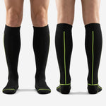 Custom mens soccer socks heel accent detail showing neon green geometric line pattern across heel cup and toe box