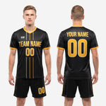 Detail shot of matching black soccer shorts with Athletic Gold side stripe from men's custom soccer uniform set