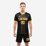 Men's black and gold soccer uniforms with chevron print, Athletic Gold V-neck trim and vertical chest stripes, front view