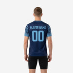 Close detail of Sky Blue geometric sublimation print on sleeve of custom Navy Blue soccer training jersey, full-dye sublimation construction
