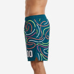 Opposite side view of mens teal sublimated basketball shorts with neon swirl design and small hem side split visible