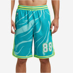 Mens custom basketball shorts in teal with neon lime flame pattern and side stripe, front view showing player number 88 on the thigh panel