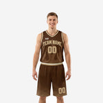Men's custom basketball uniforms in brown and gold with sublimated flame jersey and geometric fade shorts, front and back view